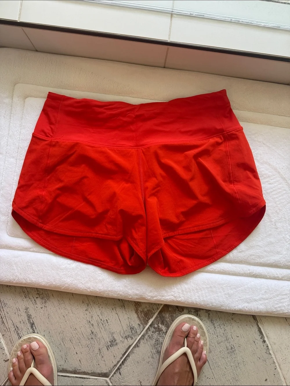 Lululemon Women’s High-Waist orange Athletic Shorts 4”